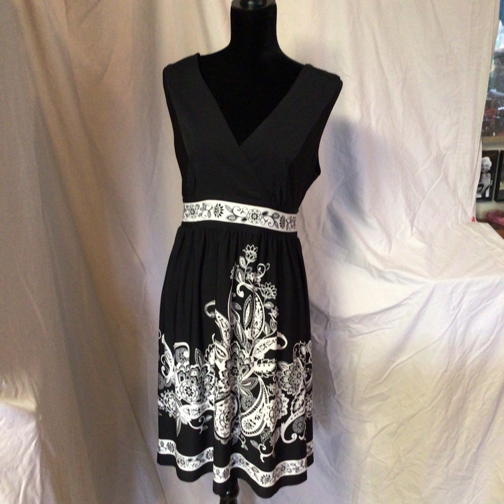 Timeless black dress with white embroidery & accented bodice